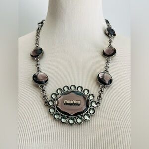 MIU MIU NECKLACE chunky black and gunmetal gray jeweled piece.